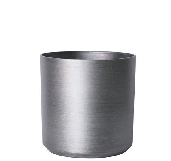 Hortus Lite - Metallic Look Plastic Cylinder Planter - Brushed Steel - Dia43 x H43cm lifestyle - metal cylinder planter with lush greenery on modern garden terrace