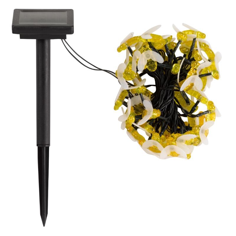 Buzzy Bee String Lights - Set of 50 lifestyle - planter with plants on garden setting
