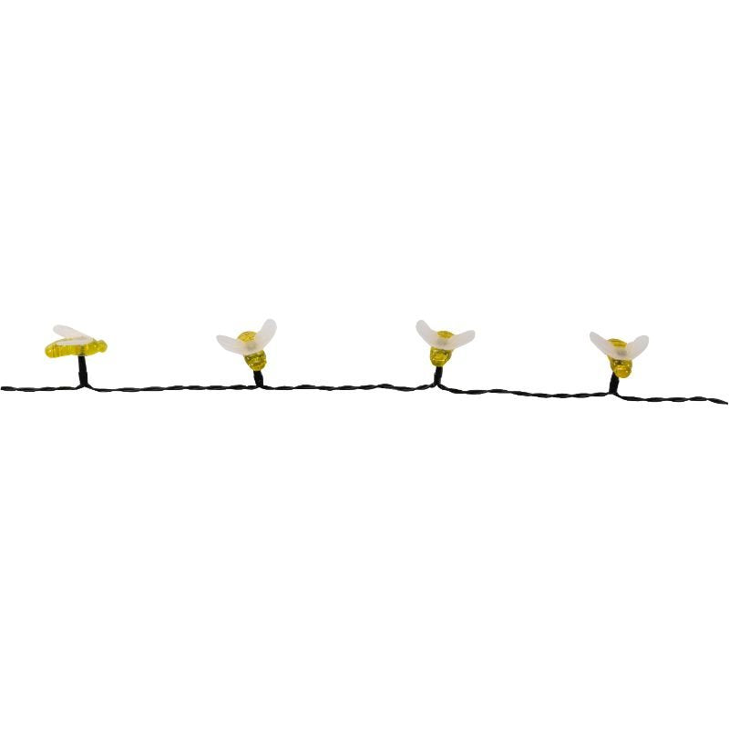 Buzzy Bee String Lights - Set of 50 lifestyle - planter with plants on garden setting