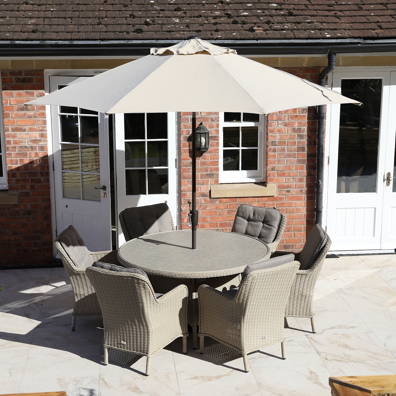 Cassano 6 Seat 140cm Round Dining Set with 3.0m Deluxe Crank Parasol