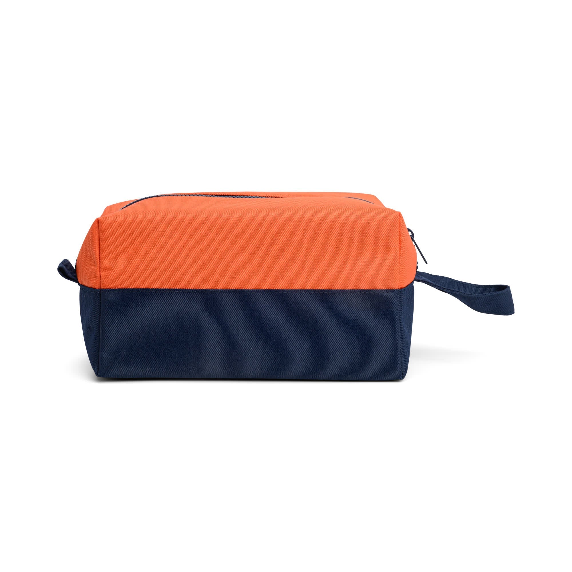 Dopp bag on white background showing zip pocket