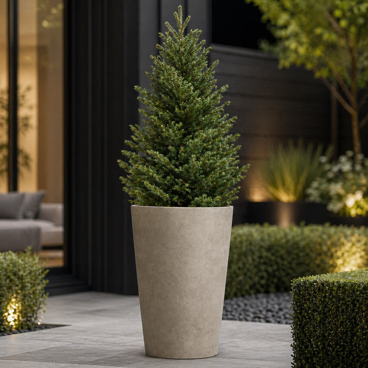 Hortus Lite - Aged Effect Tall Plastic Planter -Vintage - Dia 36.5 x H62cm lifestyle - fibreglass stone-effect planter with lush greenery on modern garden terrace