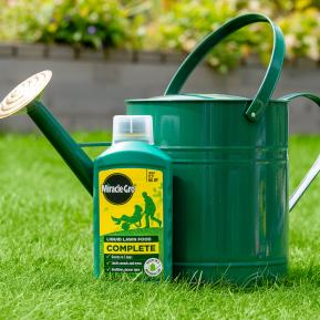 Complete Lawn Food Concentrated Liquid being applied