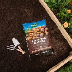 Farmyard Manure on soil raised bed