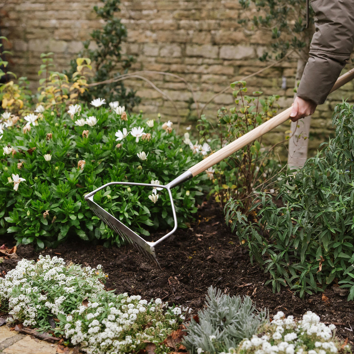 Kent & Stowe Stainless Steel Soil Rake in use