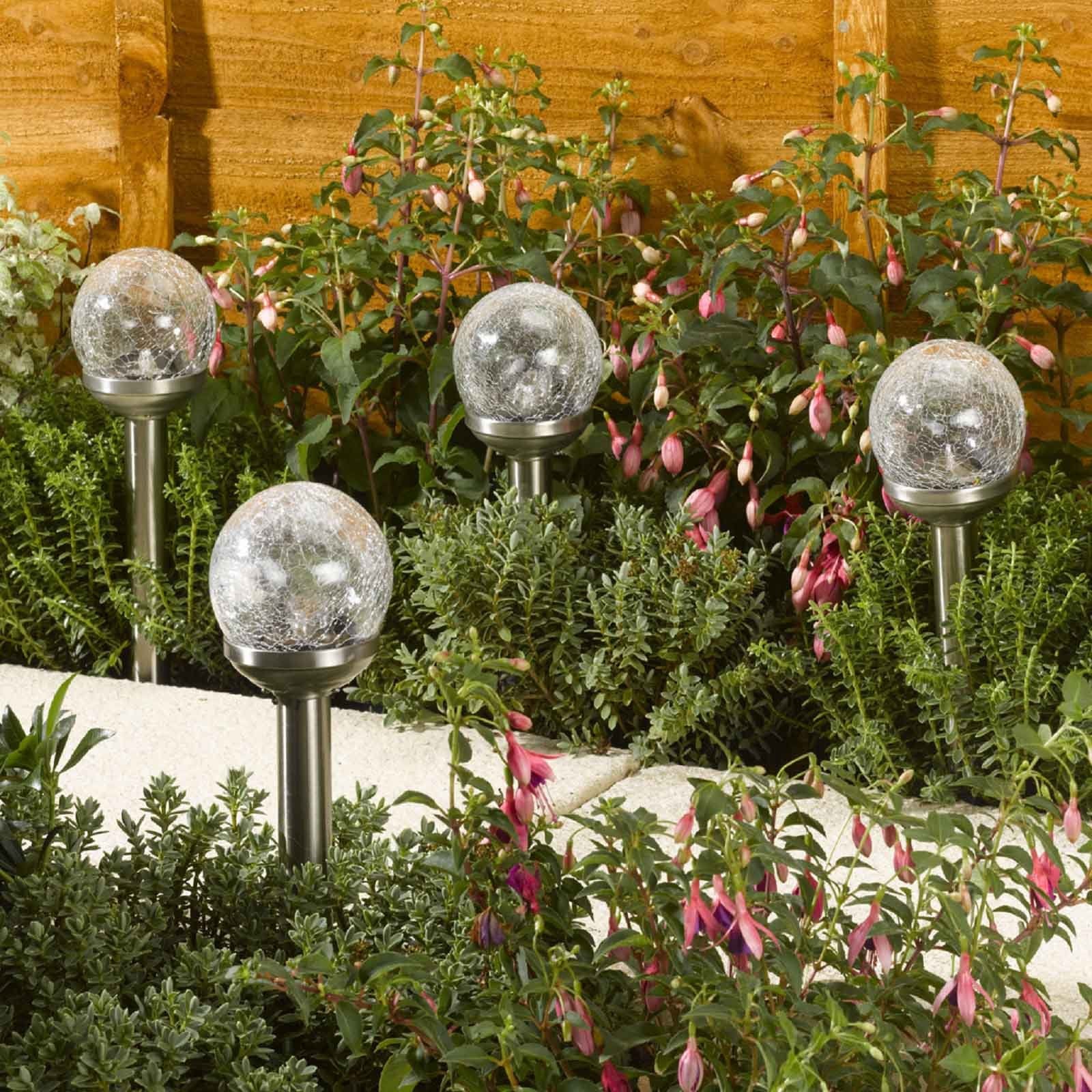 Rainbow Glass Stake lifestyle - planter with plants on garden setting