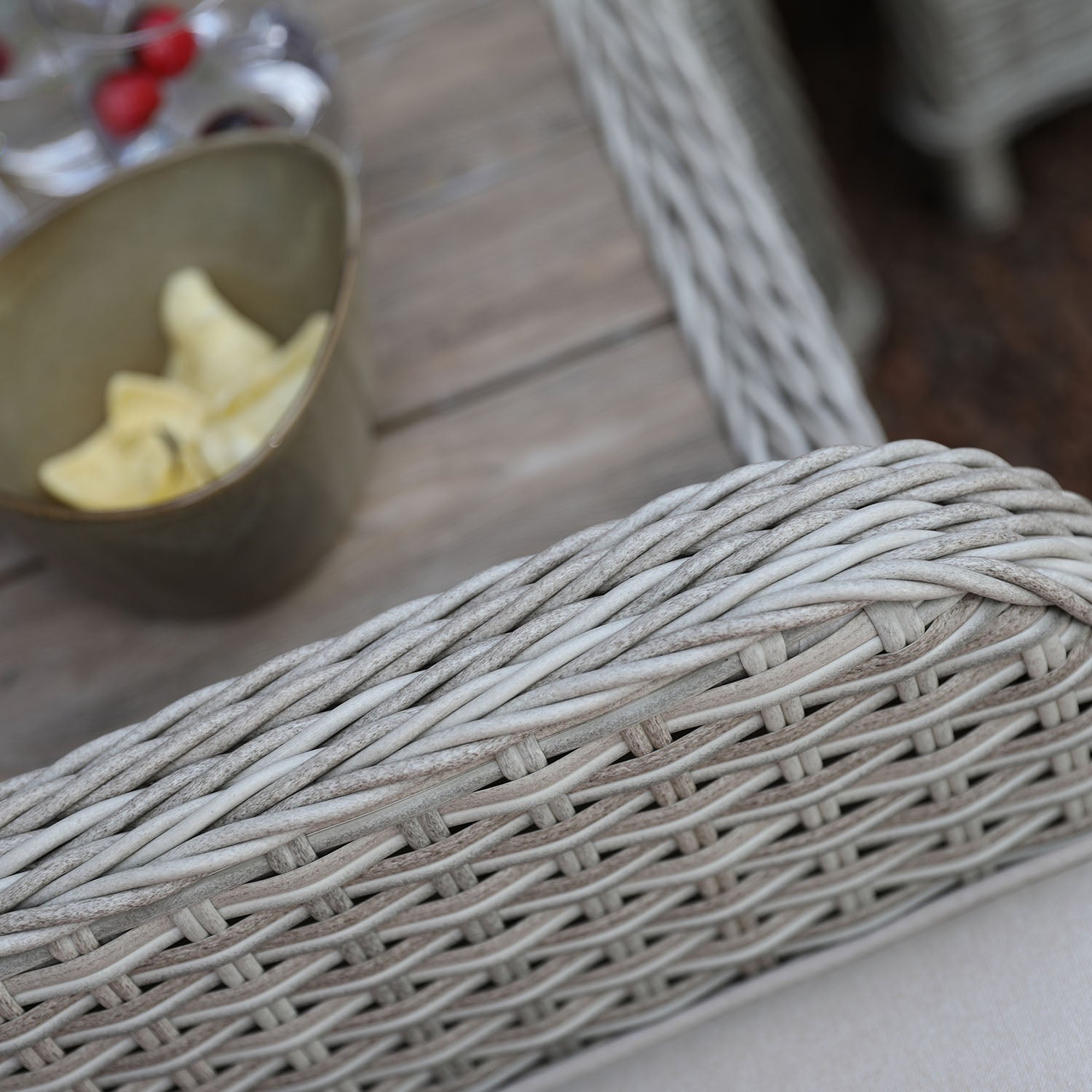 Close-up of a woven chair with a blurred background