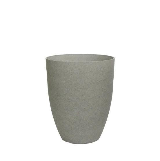 Hortus Lite - Aged Effect Plastic Mid Planter - Cement Grey - Dia 28 x Height 34.5cm lifestyle - concrete planter with lush greenery on modern garden terrace