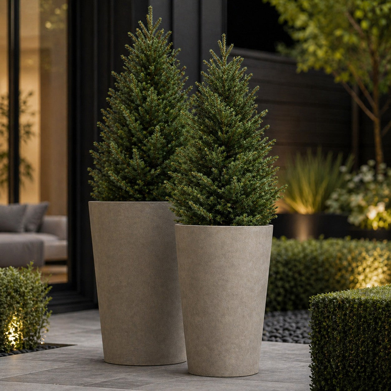 Hortus Lite - Aged Effect Tall Plastic Planter -Vintage - Dia 45.5 x H76cm lifestyle - fibreglass stone-effect planter with lush greenery on modern garden terrace
