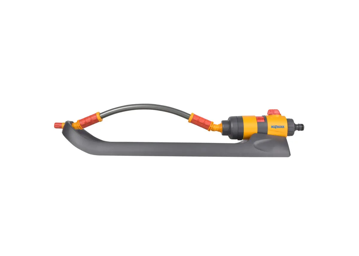 sprinkler with hose on a white background