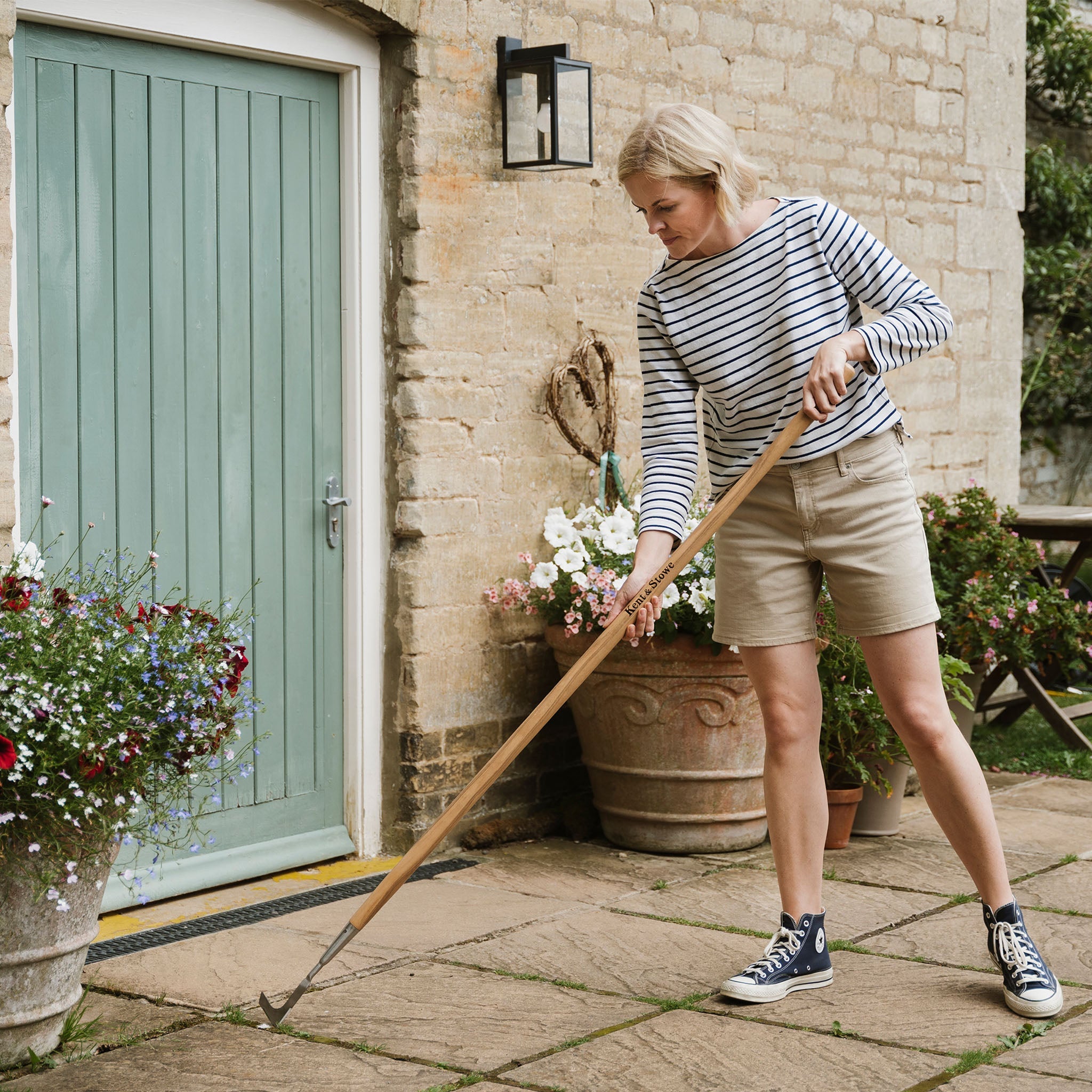 Kent & Stowe Stainless Steel Long Handled Weeding Knife in use