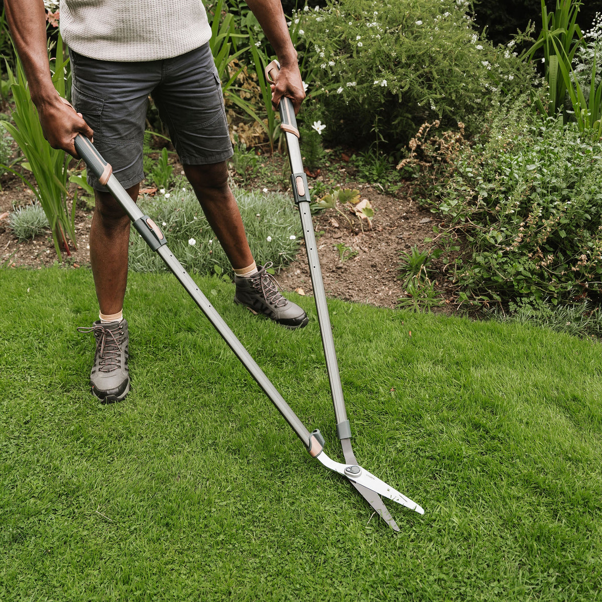Kent & Stowe SureCut Adjustable Height Lawn Shears in use